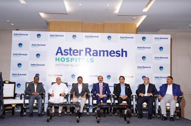 Dr. Azad Moopen & Dr. Ramesh Babu Unveil Aster Ramesh Hospitals Rebranding. Dignitaries: Mr. Ram Mohana Rao, Dr. Rayavati Mamatha, Dr. Nitish Shetty, Mr. Sunil MR, Mr. Devanand KT